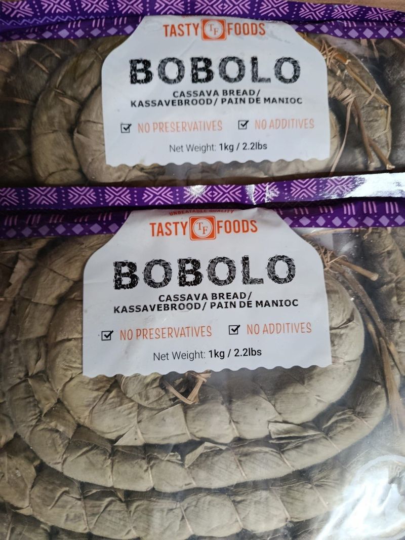 Bobolo cassava bread and staple food packaging on shelf at Domagai World Market